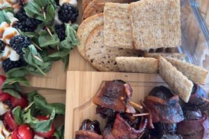 Caprese Skewers, bacon wrapped dates, and crackers