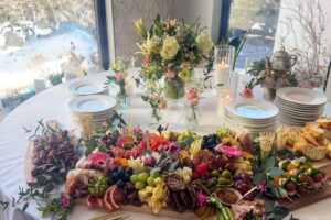 Layout of charcuterie board and apps at table for event